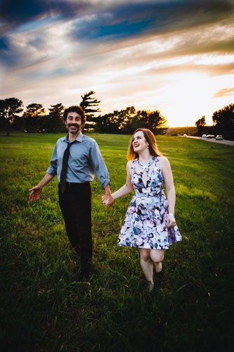 Candid field engagement photo - natural Kansas City engagement photographer