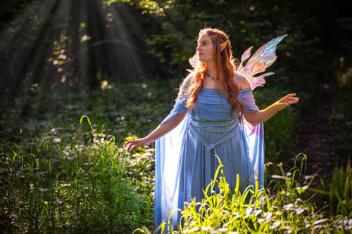 Woman dressed as a fairy in an enchanted looking forest - Kansas City fantasy photography