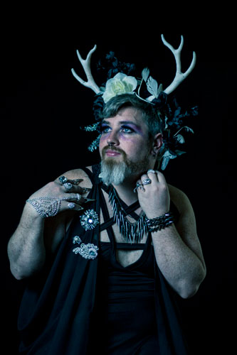 Fantasy Photograph of a man in a horned floral headdress.
