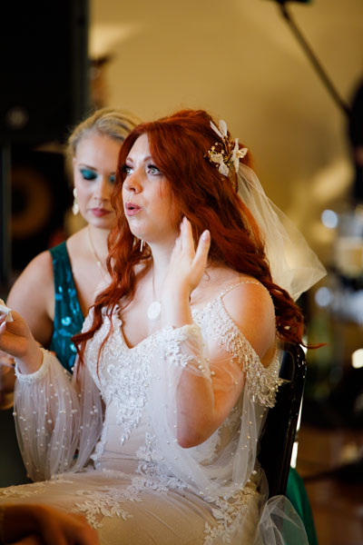 Emotional getting ready moment - Kansas City candid wedding photography