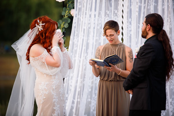Emotional outdoor wedding ceremony - Kansas City wedding photographer