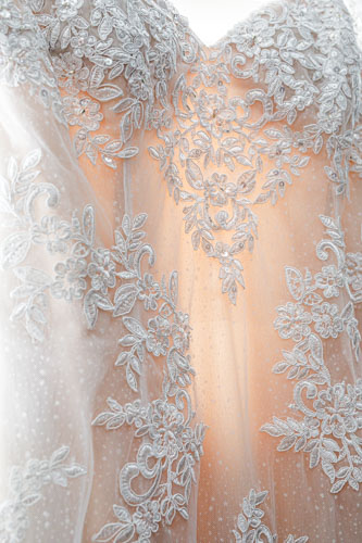 Wedding dress detail with lace and sequins - Kansas City wedding photography